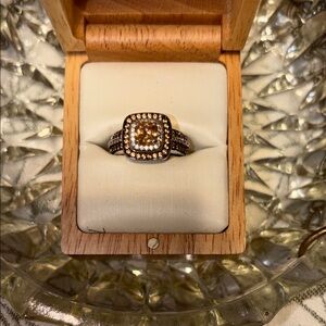 Radiant Gold and Silver Ring with Diamond Accents